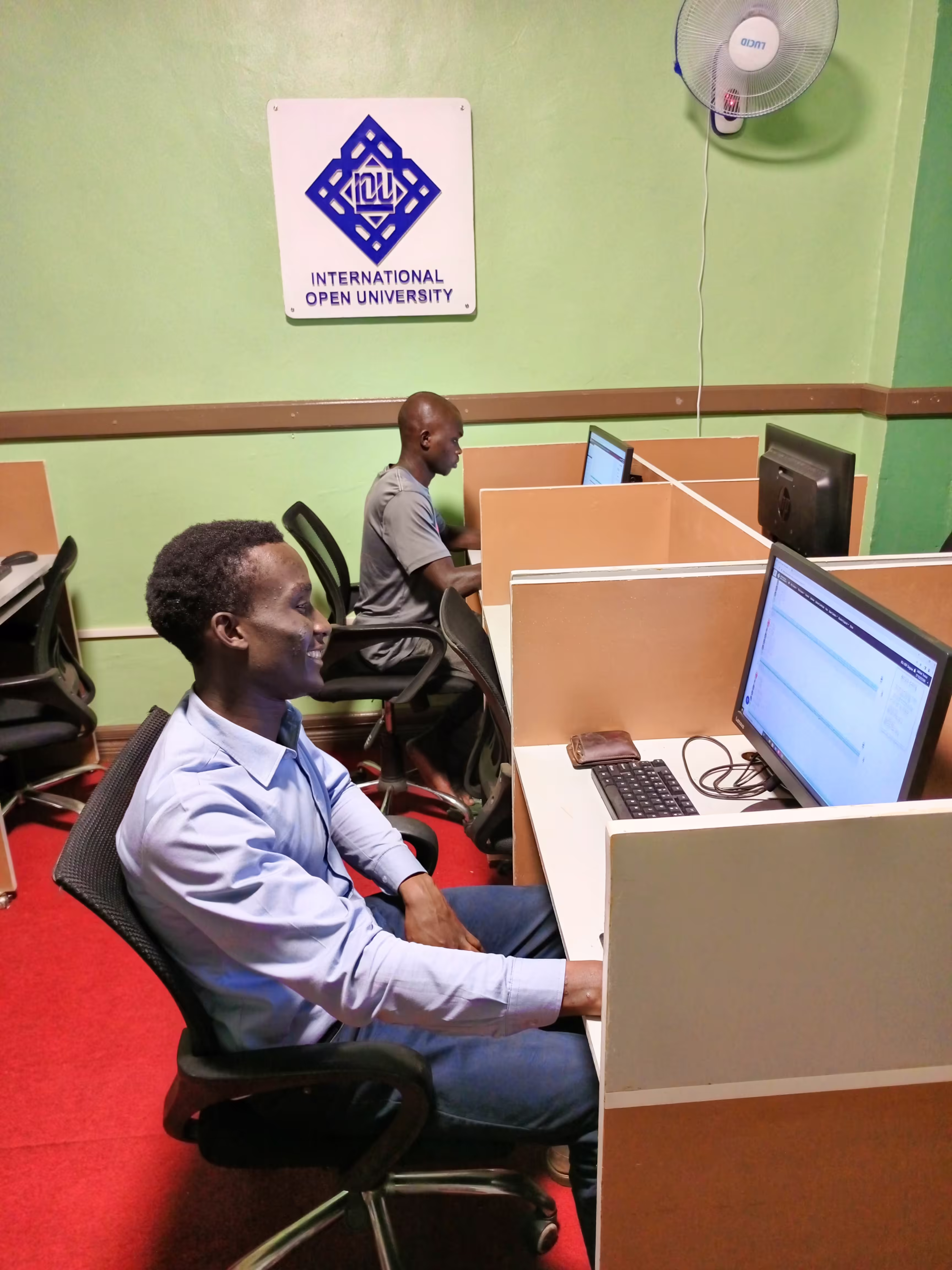 Scholars discussing in a library
